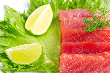 Wall Mural - tuna sushi, Tuna carpaccio, tuna sashimi with vegetables. healthy eating with seafood, we cook at home