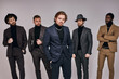 © Roman - Portrait of guys on men's fashion show, in party clothes in tux