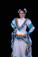 Latin woman dressed in a dress from Jalisco Mexico,