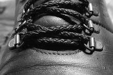 Lacing Leather Boot In Black And White Photography