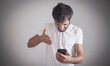 © andranik123 - Angry caucasian man with smartphone.