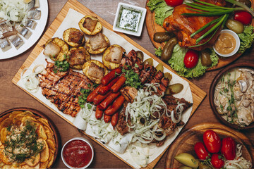 delicious European and Slavic cuisine on the big table waiting for guests. table with food, top view