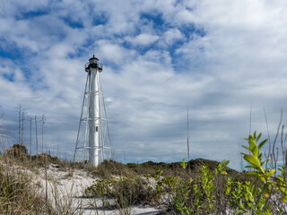 Historic white Lighthouse located on the beach in Boca Grande, Florida.