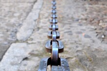 Chain Hanging From A Low Perspective