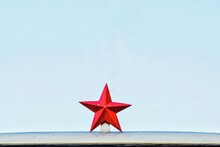 Close-up Of Red Star Against Sky Outdoors