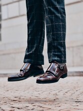 Low Section Of Man Wearing Leather Shoes