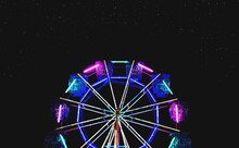 Farries Wheel With Neon Light In Carnival