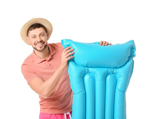 Poster - Handsome man with inflatable mattress on white background