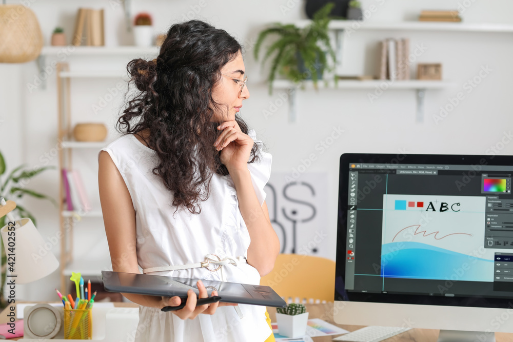 Graphic designer working in office