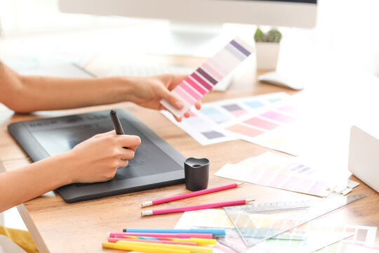 Graphic designer working in office