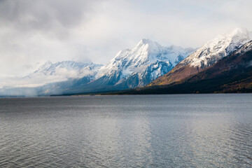 Wall Mural - snow capped  peak of the Grand Teton mountain range viewed from Jackson Lake in Wyoming.