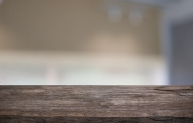 Empty wooden table in front of abstract blurred background of coffee shop . can be used for display or montage your products.Mock up for display of product