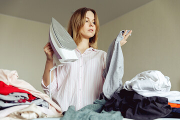 the girl is surprised how much she needs to iron