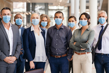 Wall Mural - Portrait of multiethnic business people group wearing mask