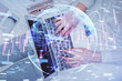 © peshkova - Double exposure of woman hands working on computer and forex graph hologram drawing. Top View. Financial analysis concept.
