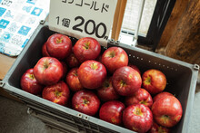 Close-up Of Apples In Container