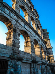 Wall Mural - Details of the ancient Roman amphitheater arena in Pula, one of the best preserved landmark of Croatia.