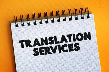 Poster - Translation Services text on notepad, business concept background