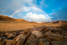 A Rainbow Appearing In The Richtersveld Landscape Between Helsberg Pass And Kokerboomkloof