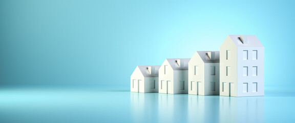 Wall Mural - which size of house can you afford? concept shot: four differently sized models of houses on a blue 