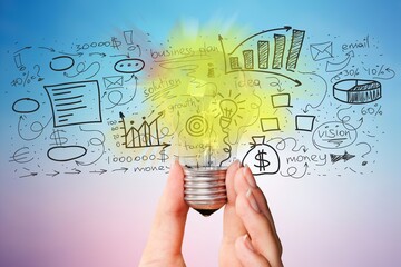 Wall Mural - Glowing glass light bulb with a financial illustration