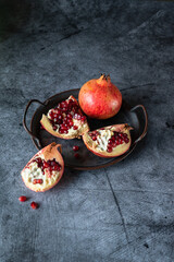 Poster - pomegranate on wooden table