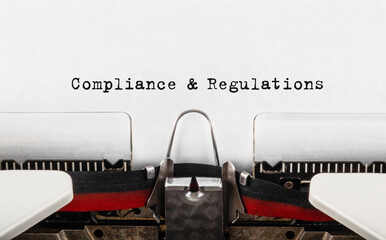 Aufkleber - Text Compliance and Regulations typed on retro typewriter