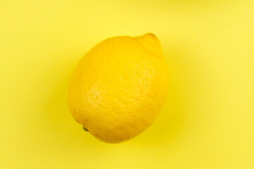 lemon on yellow background