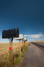 USA, South Dakota, Row Of Rural Mailboxes On Roadside