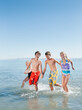 © Erik Isakson/Tetra Images - Kids (6-7,8-9,10-11,12-13) playing in lake