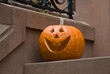 © Antonio M. Rosario/Tetra Images - Jack-o-lantern on step