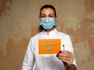 Wall Mural - Healthcare concept meaning Swollen Lips with sign on the piece of paper.