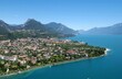 Aerial View Of Townscape By Lake Garda Against Sky