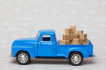Toy Pickup Truck  Delivering  Blank Cardboard Boxes