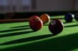 © JokimiyaPhoto - Close-up billiard balls on green table