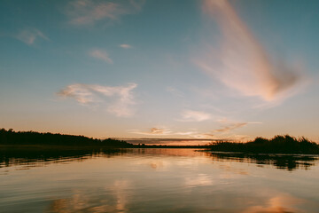 Sunset over the Lielupe river in Latvia during warm summer evening