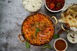 Indian meal buffet Background - Chicken Biryani chilli chicken butter Naan salad Salan