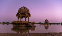 Chhatri Stone Gazebo In Lake Against Sky