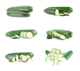 Wall Mural - Set of cut and whole fresh zucchinis on white background.