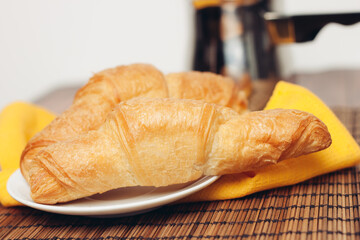 croissants in a plate on the table meal dessert for breakfast