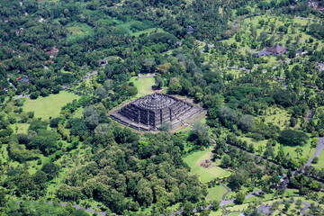 Wall Mural - The splendor of Borobudur Temple seen from above in Magelang, Indonesia. One of the heritage buildings that are still functioning as a praying place for Buddhists in the world 