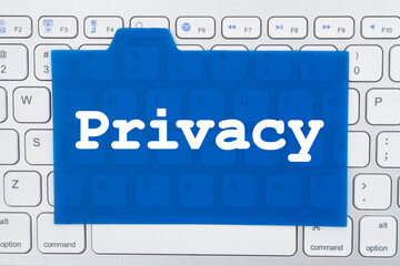 Wall Mural - Privacy message on a blue translucent note card on a gray keyboard