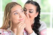 © aletia2011 - Close-up portrait of a charming teenager  girl with mom sharing secret