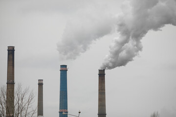 Chimney of a power station during a cold winter day in Bucharest.