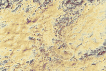Closeup Shot Of A Weathered Yellow Rock Surface