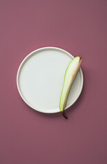 Wall Mural - abstract flat lay composition with plate and pear slice