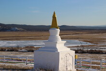 Buddhist Stupa Religious Place For Praying Made Of Stone. White Statues In Autumn Winter Season 