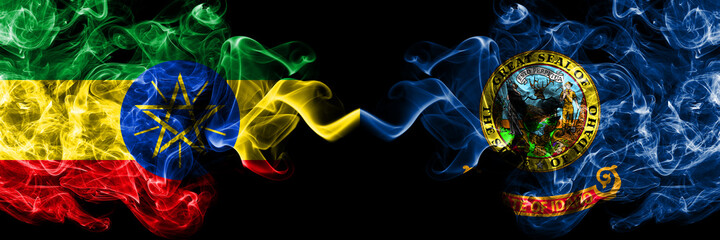 Ethiopia, Ethiopian vs United States of America, America, US, USA, American, Idaho smoky mystic flags placed side by side. Thick colored silky abstract smoke flags.