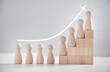 © andranik123 - Wooden human figures in the stairs. Business. Career. Growth. Success