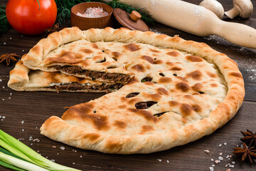 Wall Mural - National traditional Caucasian food, Ossetian pies, khachapuri, chudu